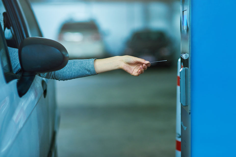 Person withdrawing money from an ATM. 